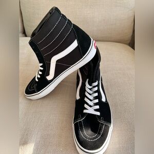 Vans Black and White High-Top Sneakers